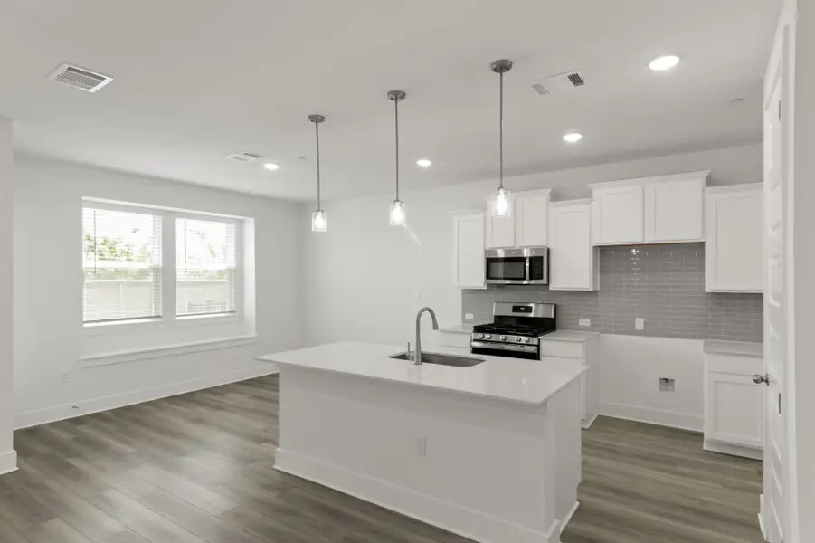 Furnished interior view inside a new home in Center 45, Round Rock (Image 7).