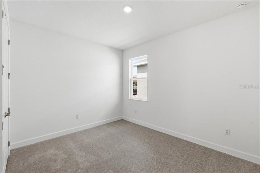 Spacious, unfurnished interior of a new home in Marisol Pointe at MiraBay Florida Series, Apollo Beach (Image 3).