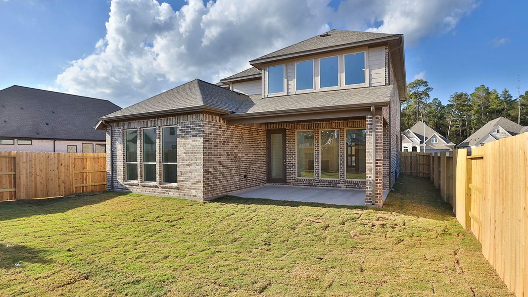 Exterior details and patio area of a home in Artavia 45', Conroe (Image 3). Exterior details and patio area of a home in Artavia 45', Conroe (Image 3).