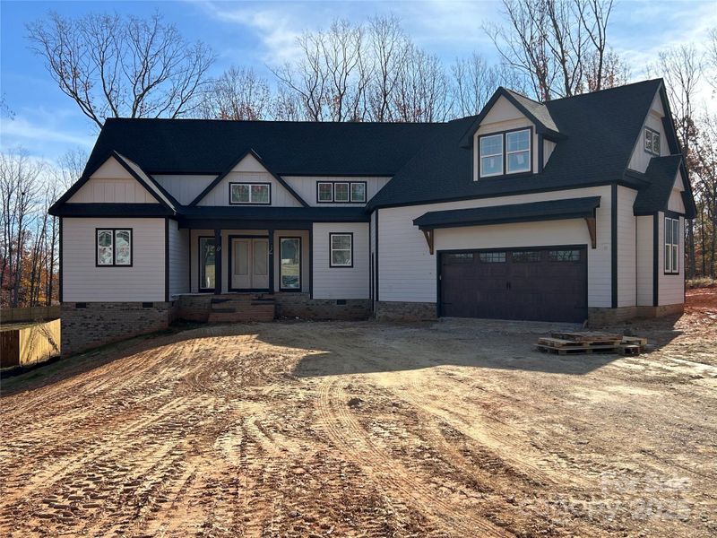 Front exterior of a new home in , Lincolnton, NC, highlighting curb appeal (Image 2).