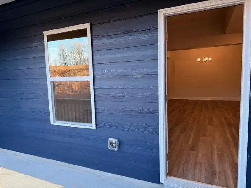 Exterior details and patio area of a home in Magnolia Villas, Cornelia (Image 1). Exterior details and patio area of a home in Magnolia Villas, Cornelia (Image 1).