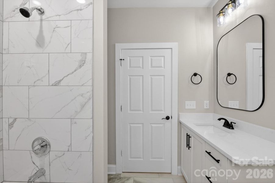 Furnished interior view inside a new home in , Lenoir (Image 27).