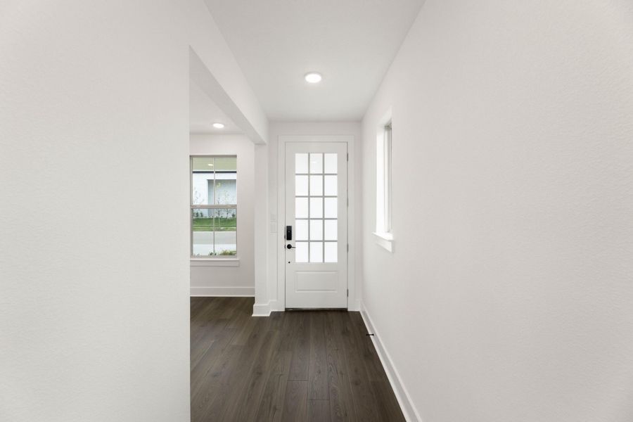 Spacious, unfurnished interior of a new home in Cottage Collection at Harvest, Argyle (Image 14).