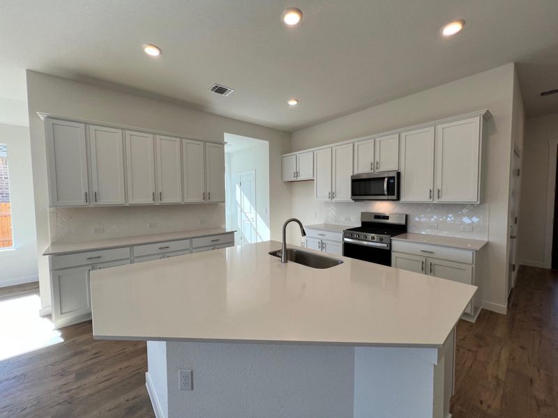 Furnished interior view inside a new home in Rosenbusch Ranch, Leander (Image 4). Furnished interior view inside a new home in Rosenbusch Ranch, Leander (Image 4).