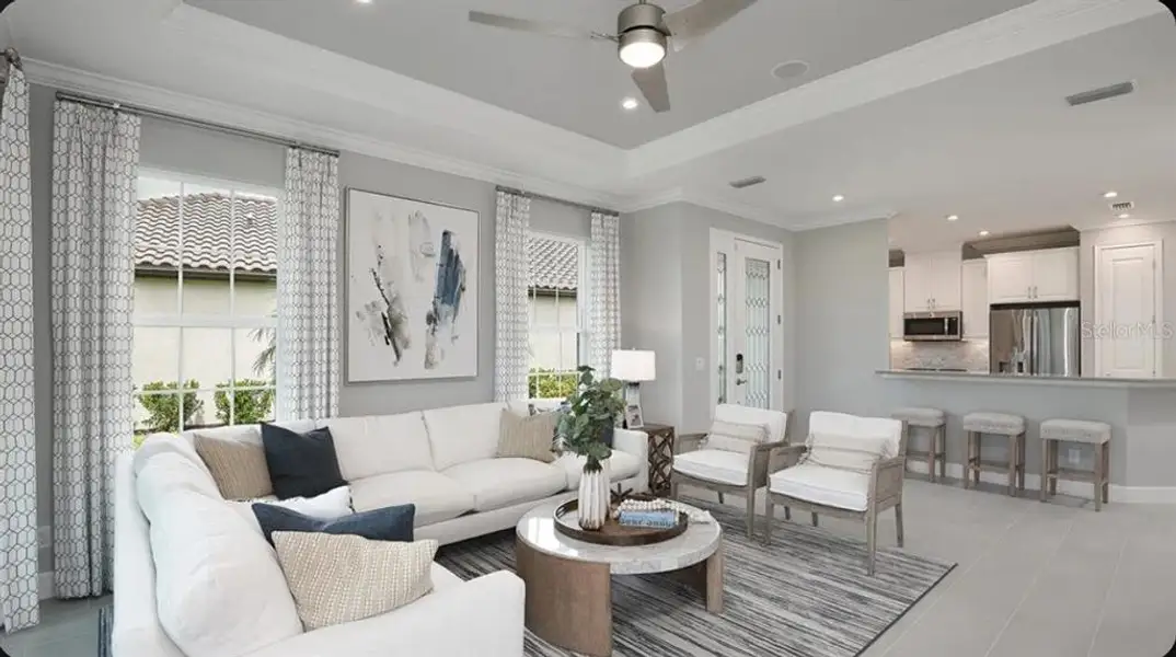 Furnished interior view inside a new home in Esplanade at Wellen Park, Englewood (Image 8).