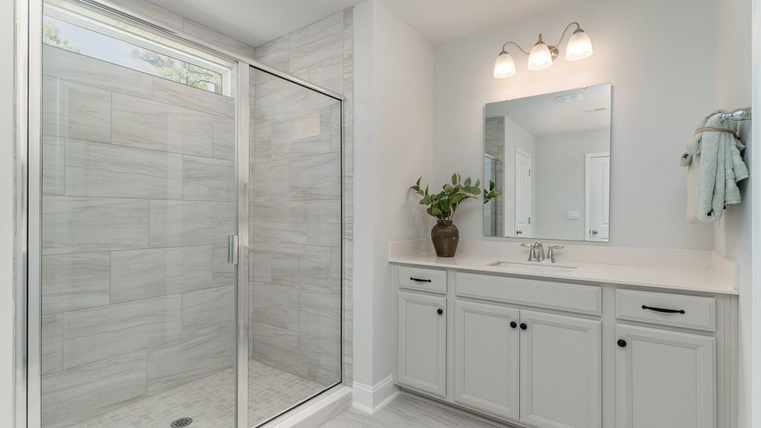 Representative furnished interior of a home built from the HARBOR OAK by D.R. Horton in Spring View Landing, Loris (Image 7).