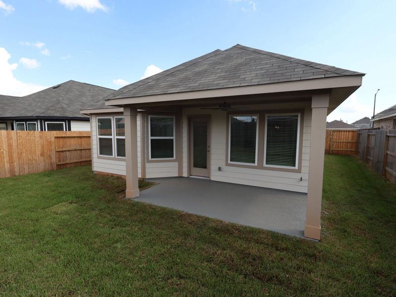 Exterior details and patio area of a home in Moran Ranch, Willis (Image 16). Exterior details and patio area of a home in Moran Ranch, Willis (Image 16).