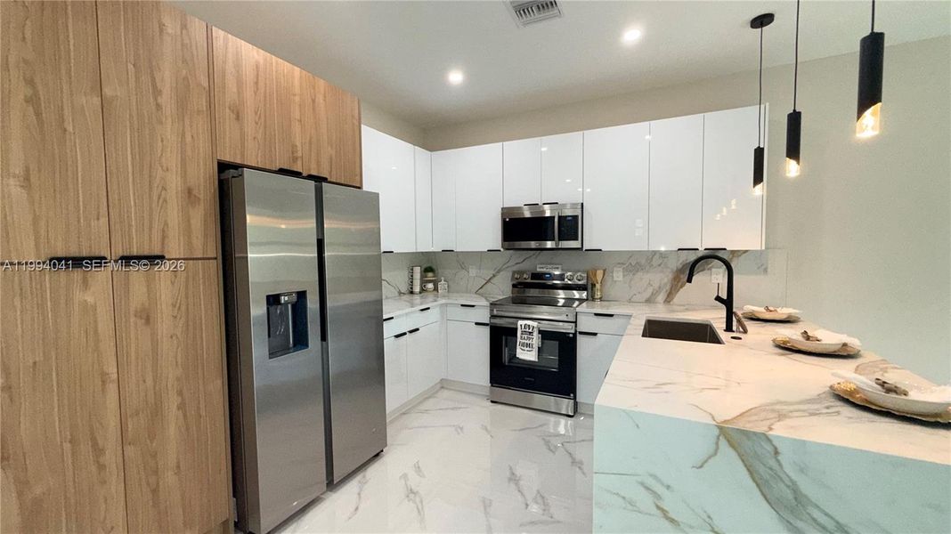 Furnished interior view inside a new home in , Lehigh Acres (Image 10).