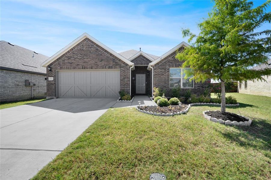 Front exterior of a new home in , Celina, TX, highlighting curb appeal (Image 1).