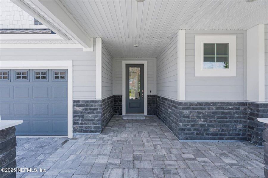 Exterior details and patio area of a home in Trailmark - Phase 6, St. Augustine (Image 2). Exterior details and patio area of a home in Trailmark - Phase 6, St. Augustine (Image 2).