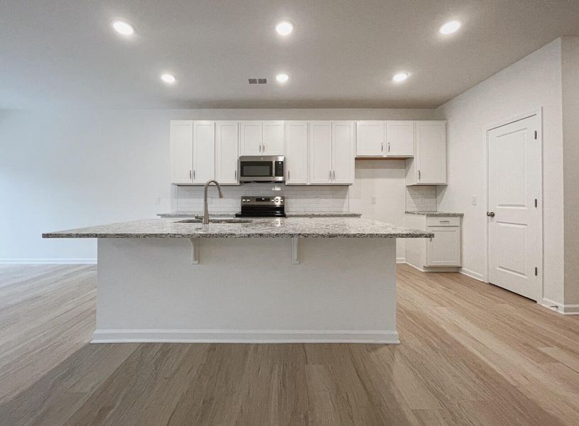 Furnished interior view inside a new home in East Main Townes, Spartanburg (Image 6).