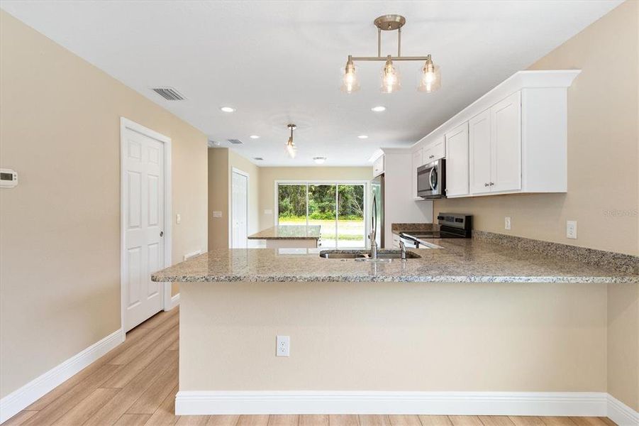Furnished interior view inside a new home in , Bushnell (Image 8).