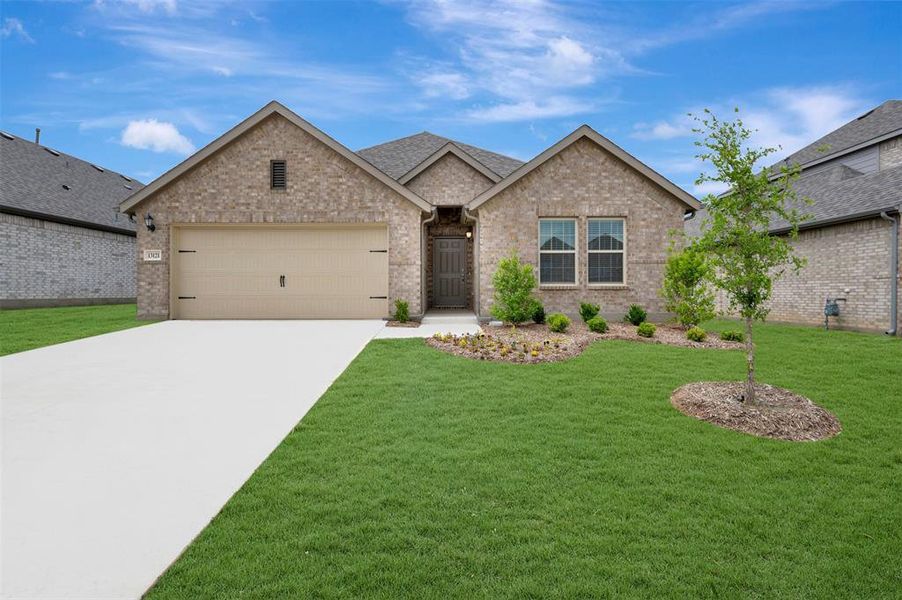 Front exterior of a new home in Woodstone, Providence Village, TX, highlighting curb appeal (Image 23).