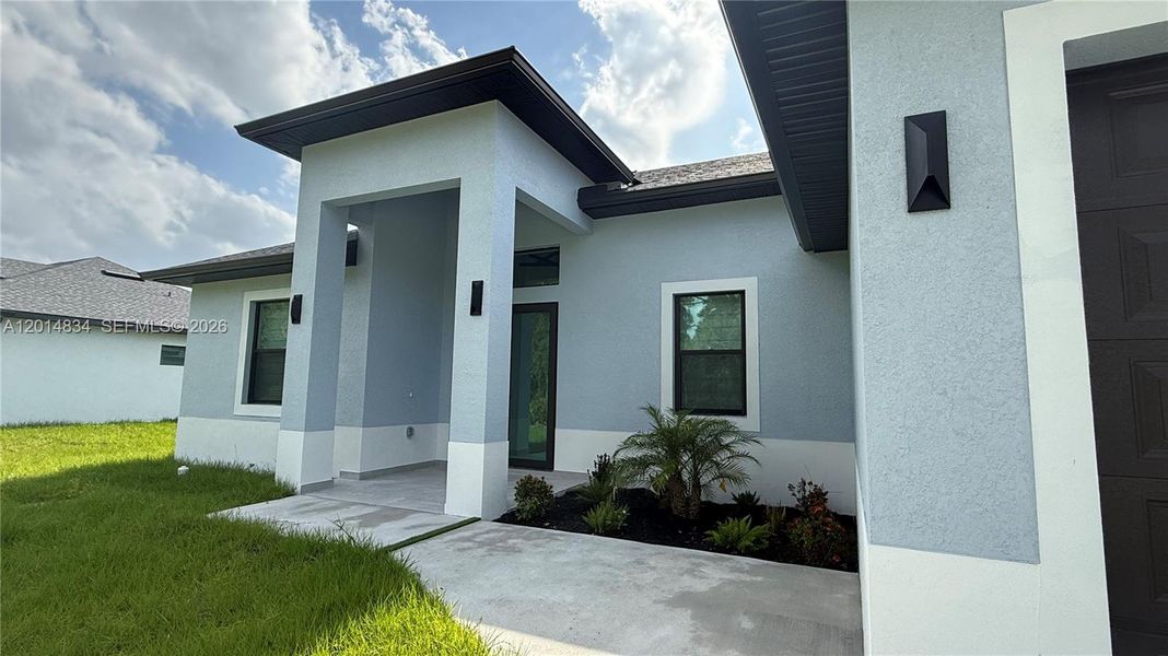 Exterior details and patio area of a home in , Lehigh Acres (Image 3).