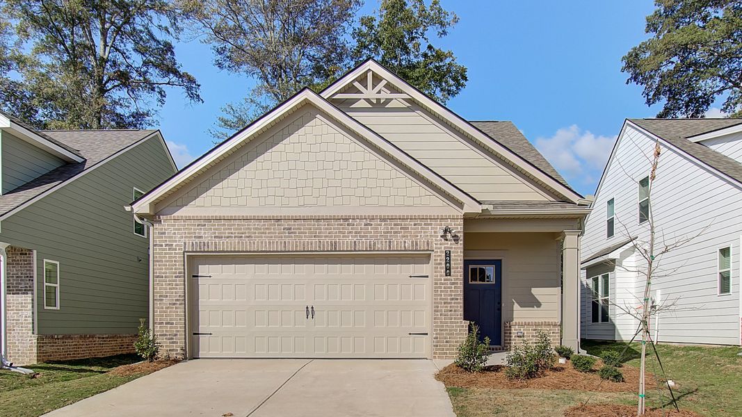 Representative exterior photo of a completed home built from the Emma by DRB Homes in Enclave at Evergreen, Fairburn, GA (Image 22). Representative exterior photo of a completed home built from the Emma by DRB Homes in Enclave at Evergreen, Fairburn, GA (Image 22).
