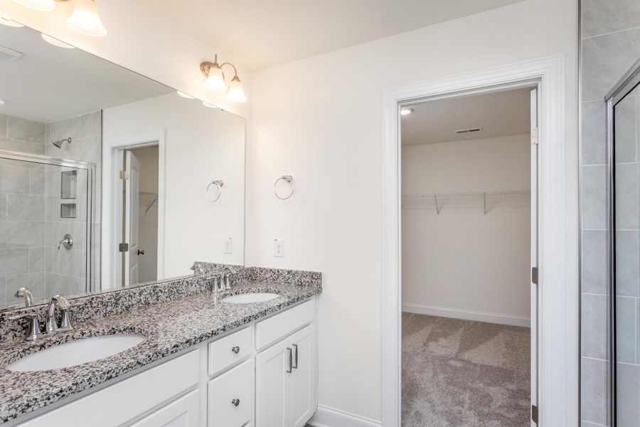 Furnished interior view inside a new home in Daniel Farms, Benson (Image 11).