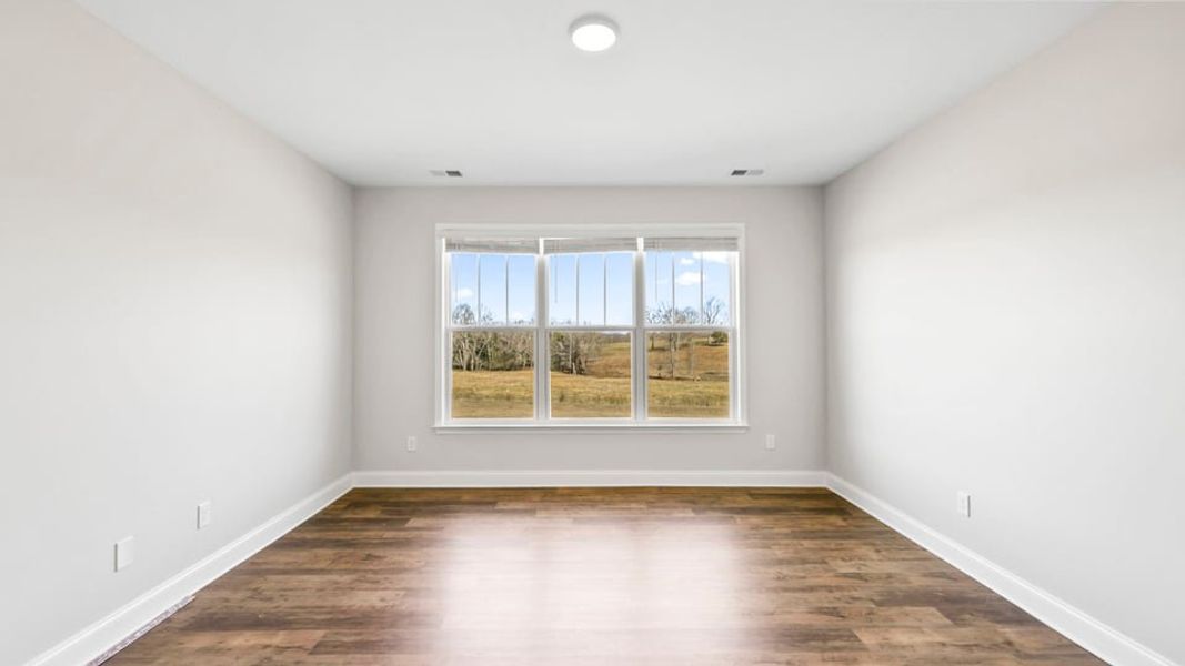 Representative unfurnished interior of a home built from the Crestone by D.R. Horton in Blue Ridge Trail, Fountain Inn (Image 23).