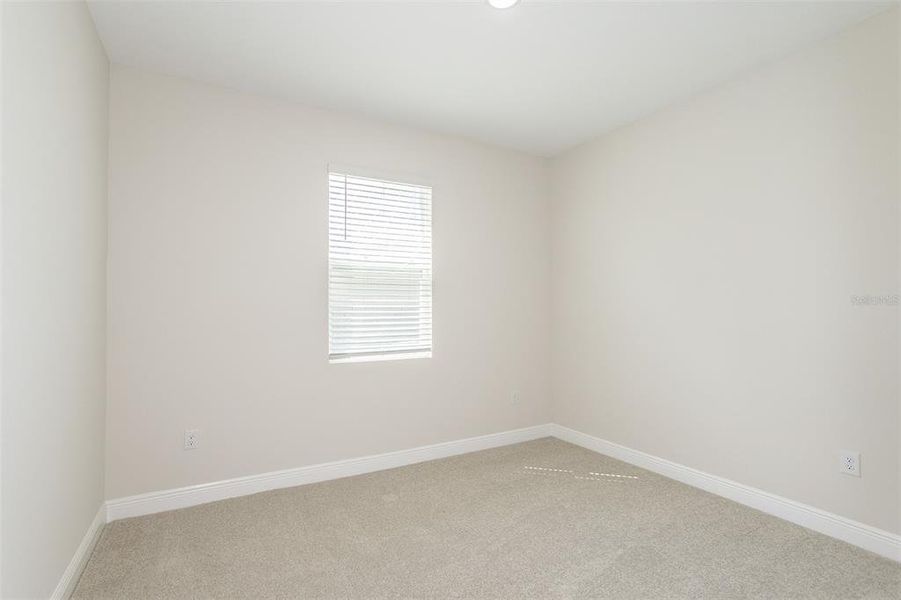 Spacious, unfurnished interior of a new home in Pasadena Woods, Dade City (Image 25).