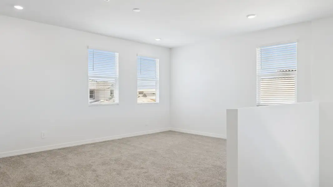 Spacious, unfurnished interior of a new home in El Cidro, Goodyear (Image 32).