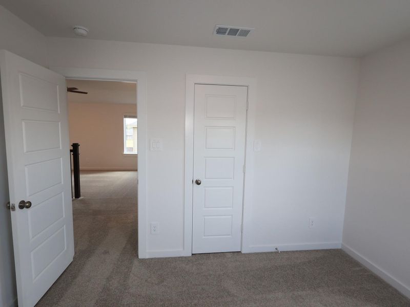 Spacious, unfurnished interior of a new home in Pinewood at Grand Texas, New Caney (Image 26).