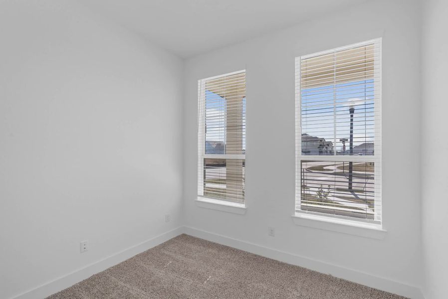 Representative unfurnished interior of a home built from the St Andrews by Chesmar Homes in Riceland Alley Loads, Mont Belvieu (Image 40).
