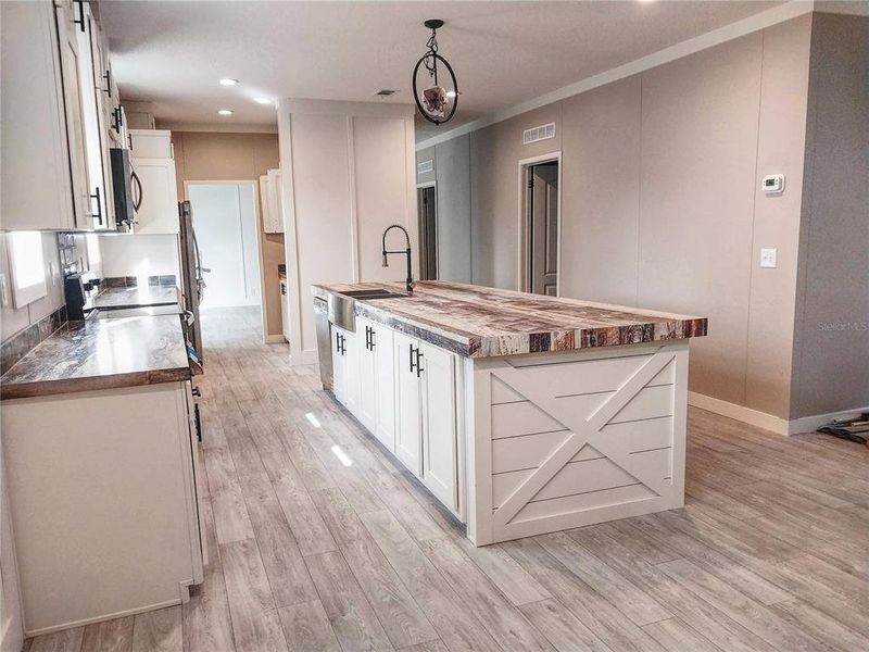 Furnished interior view inside a new home in , Frostproof (Image 6). Furnished interior view inside a new home in , Frostproof (Image 6).