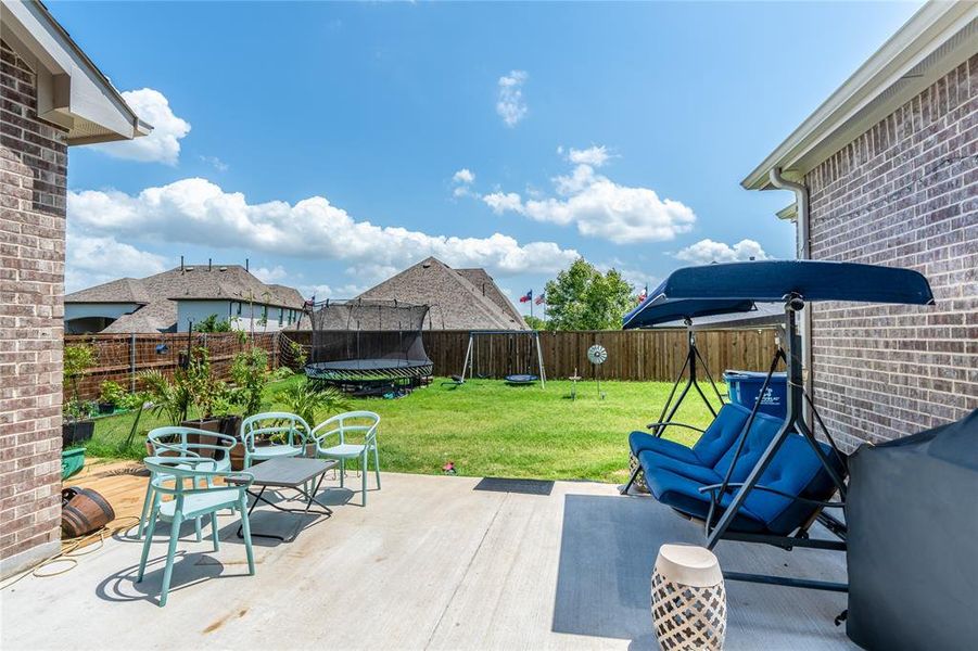View of fenced backyard