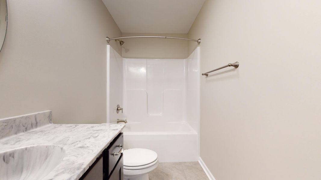 Representative furnished interior of a home built from the Corbin A by JC Jackson Homes,LLC in Heritage Pointe, Newport (Image 11).