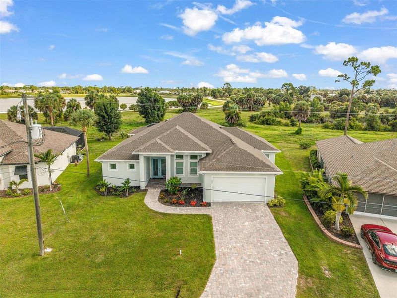 Front exterior of a new home in , Rotonda West, FL, highlighting curb appeal (Image 22).