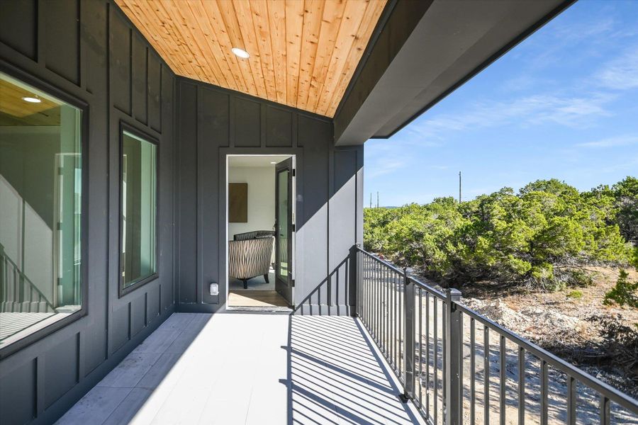 An inviting private deck provides an elevated outdoor retreat with scenic natural views.