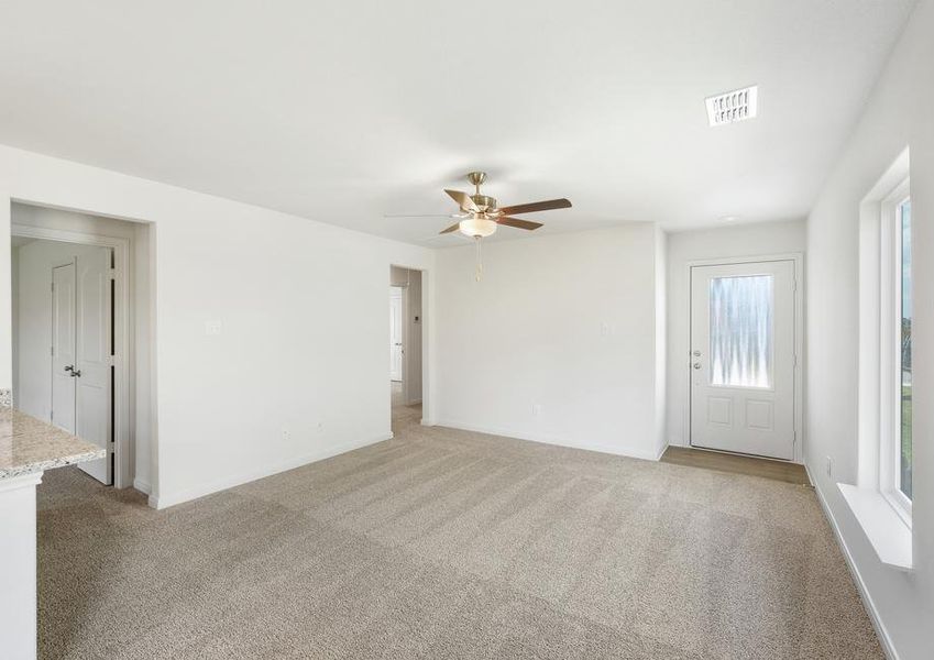 The spacious family room is perfect for family living and hosting.