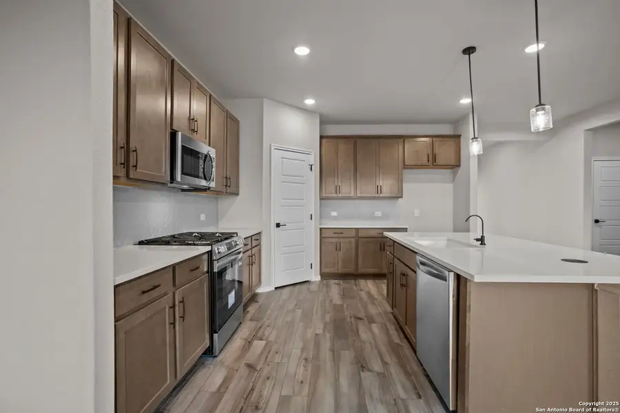 Furnished interior view inside a new home in Comanche Ridge, San Antonio (Image 6).