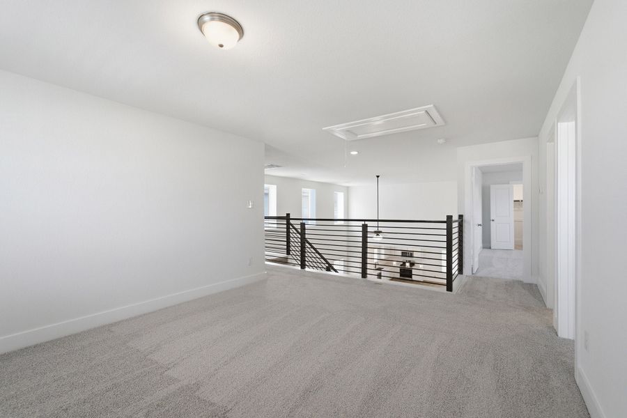 Spacious, unfurnished interior of a new home in Sunfield, Buda (Image 55).