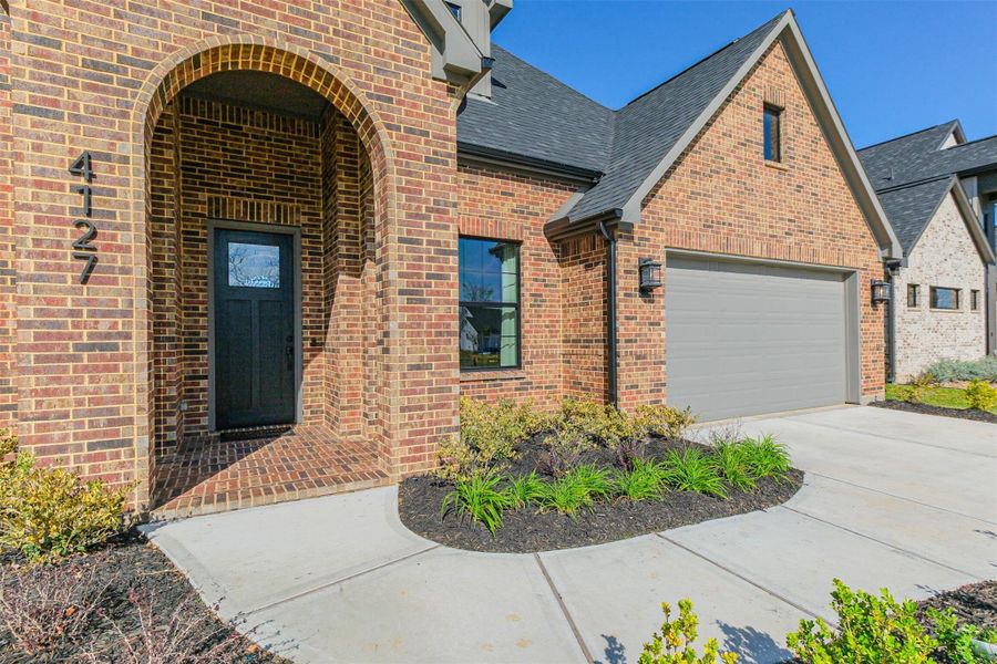 Walkway to covered front entrance where memories await!