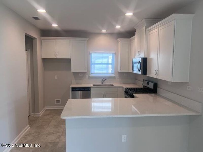 Furnished interior view inside a new home in TrailMark, St. Augustine (Image 6).