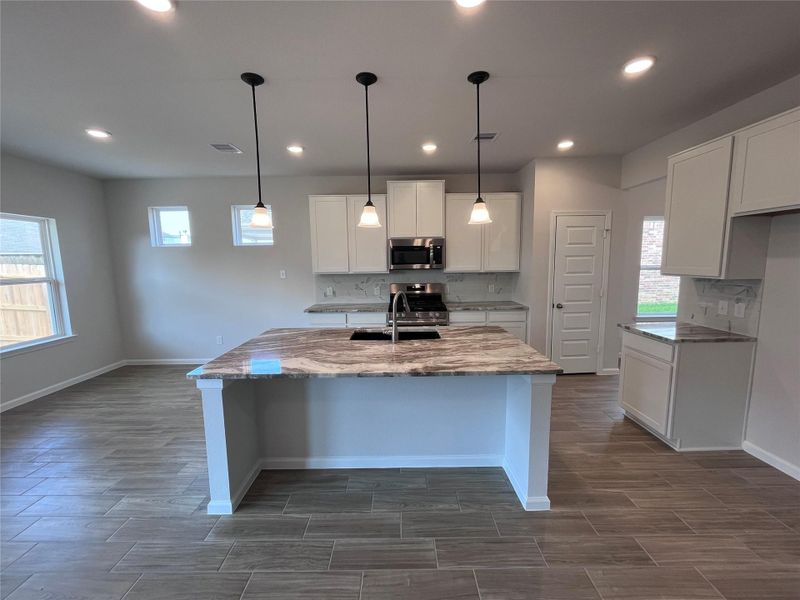 Furnished interior view inside a new home in Kendall Lakes, Alvin (Image 3). Furnished interior view inside a new home in Kendall Lakes, Alvin (Image 3).