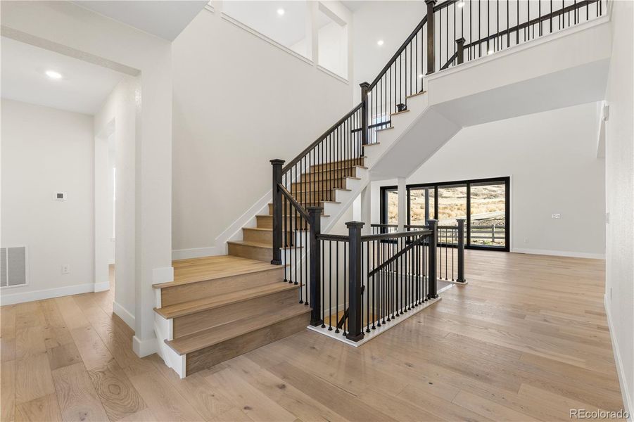 Spacious, unfurnished interior of a new home in Autograph at Lyric, Lone Tree (Image 42).