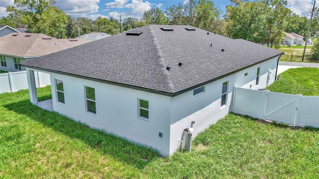 Exterior details and patio area of a home in , Summerfield (Image 22).
