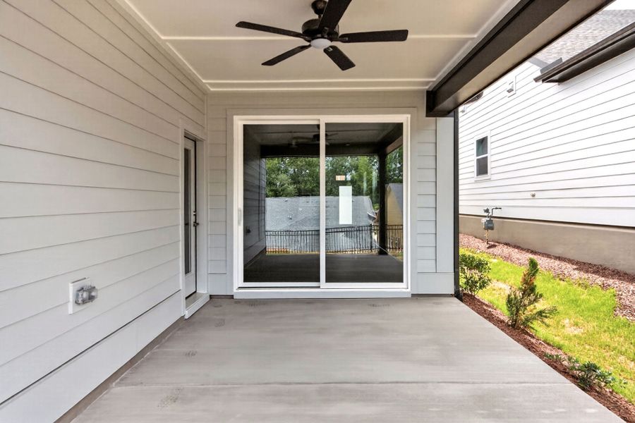 Exterior details and patio area of a home in Encore at Chatham Park – Villa Series, Pittsboro (Image 4).