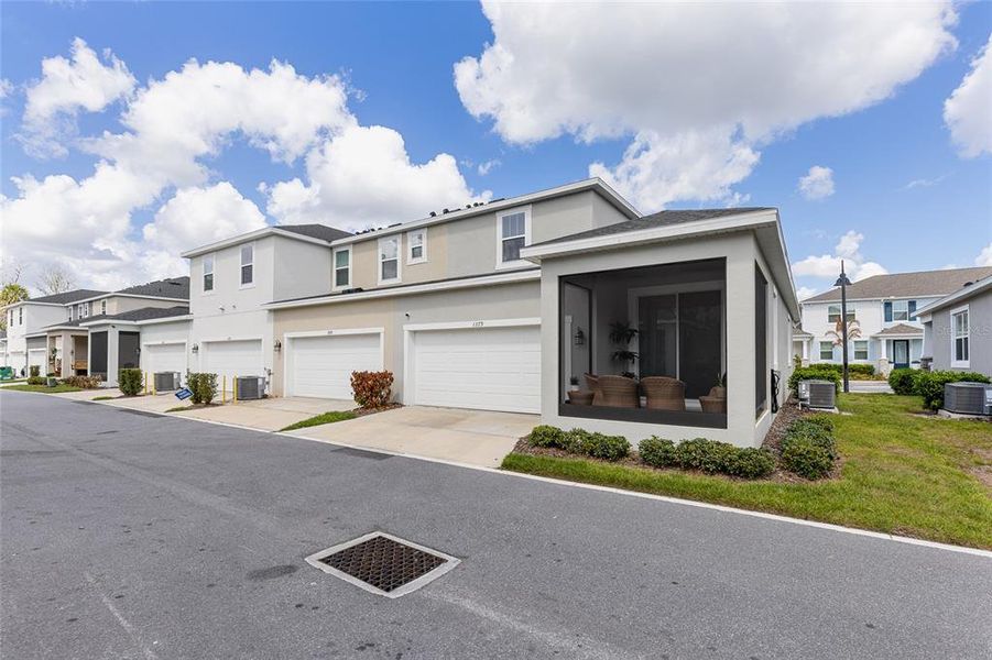 Front exterior of a new home in Hickory Grove, Winter Springs, FL, highlighting curb appeal (Image 26).