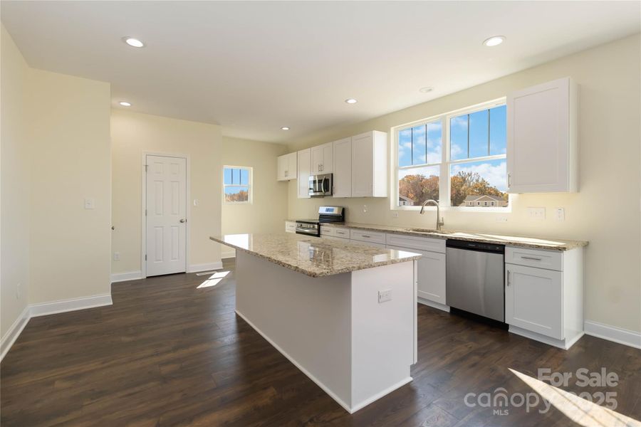 Furnished interior view inside a new home in , Monroe (Image 6).