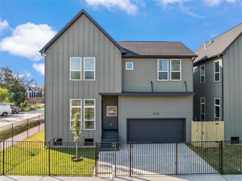 Vecino homes introduces it's most affordable fully gated modern farmhouse community with automatic driveway gates located in Fifth Ward as this fully staged model unit is ready to be viewed and admired perfect for our first time homebuyers. Model unit is featured as an exact example of the unit for sale which is the home on the right of this photo.