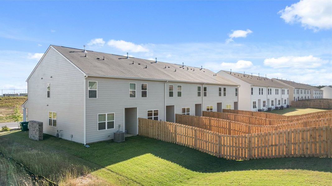 Front exterior of a new home in Laurel Park Townhomes, Hephzibah, GA, highlighting curb appeal (Image 19).