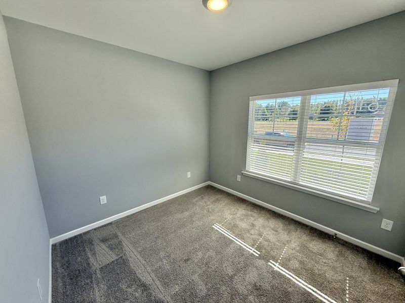 Spacious, unfurnished interior of a new home in Stone Fort Meadows, Manchester (Image 11).