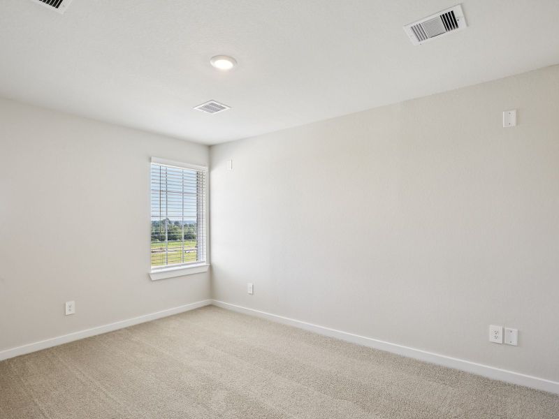 Spacious, unfurnished interior of a new home in Sundance Cove - Premier Series, Crosby (Image 16).