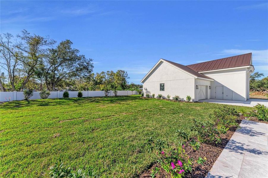 Front exterior of a new home in , Sarasota, FL, highlighting curb appeal (Image 27). Front exterior of a new home in , Sarasota, FL, highlighting curb appeal (Image 27).