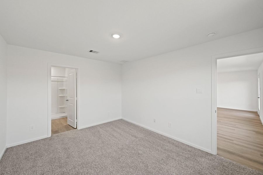 Spacious, unfurnished interior of a new home in The Canopies, Splendora (Image 13).
