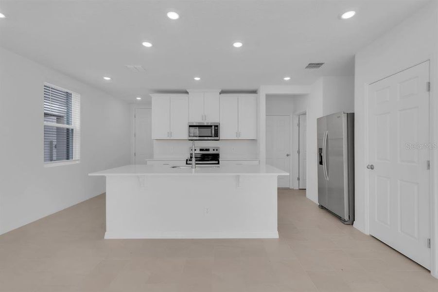 Furnished interior view inside a new home in , St. Cloud (Image 8).