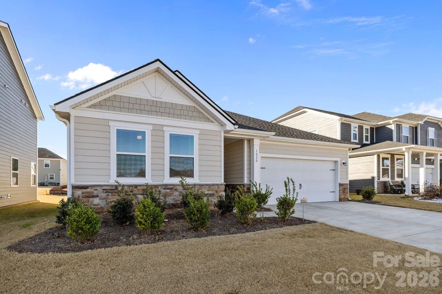 Front exterior of a new home in Sheffield, Indian Trail, NC, highlighting curb appeal (Image 25).