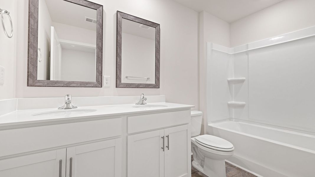 Furnished interior view inside a new home in Bentley Park, Greenwood (Image 10). Furnished interior view inside a new home in Bentley Park, Greenwood (Image 10).